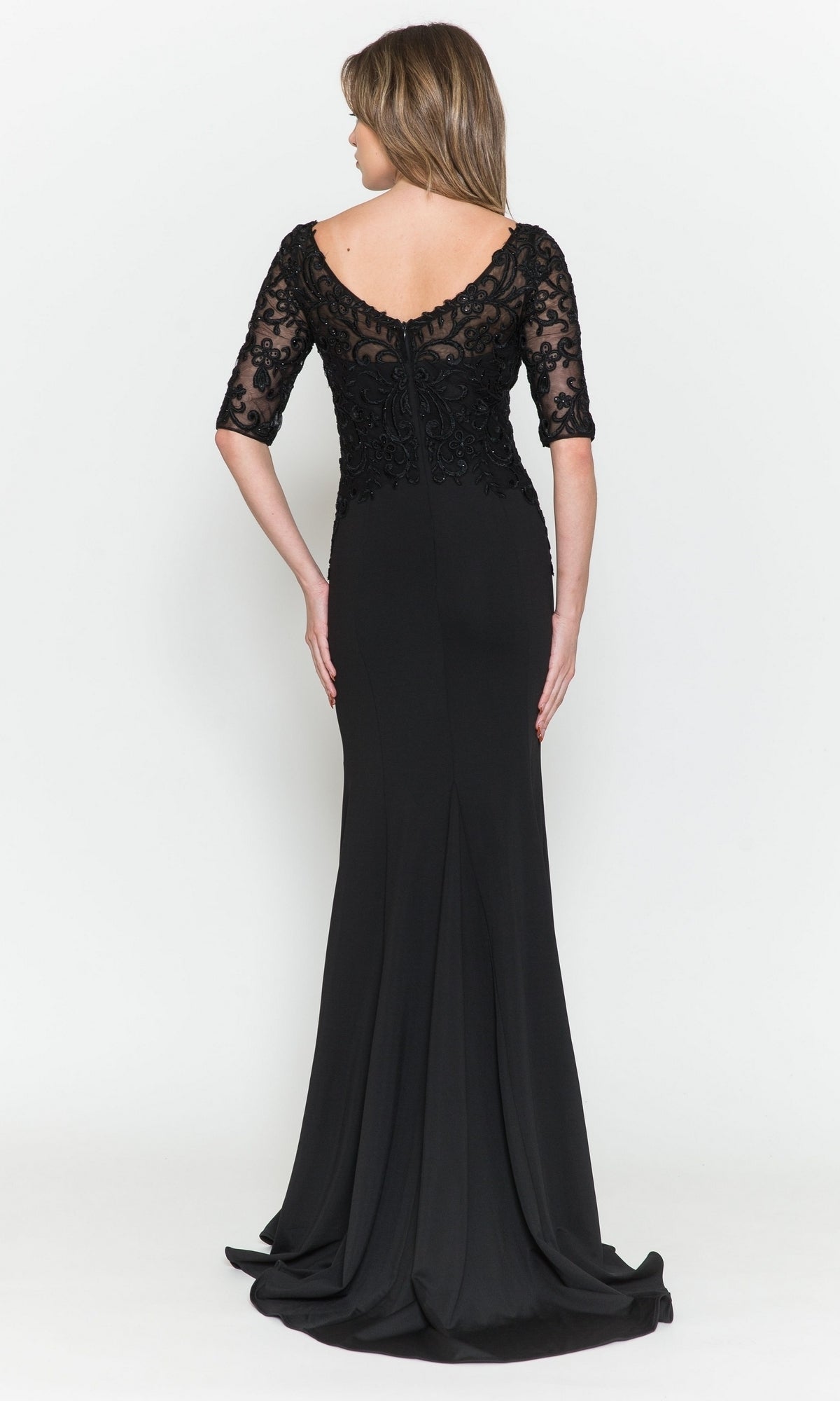 A woman faces away, wearing the Embroidered Sheer-Sleeved Formal Prom Dress 8560, featuring an embroidered v-neck, sheer sleeves, a fitted bodice, and a floor-length skirt flowing elegantly against a plain white background.